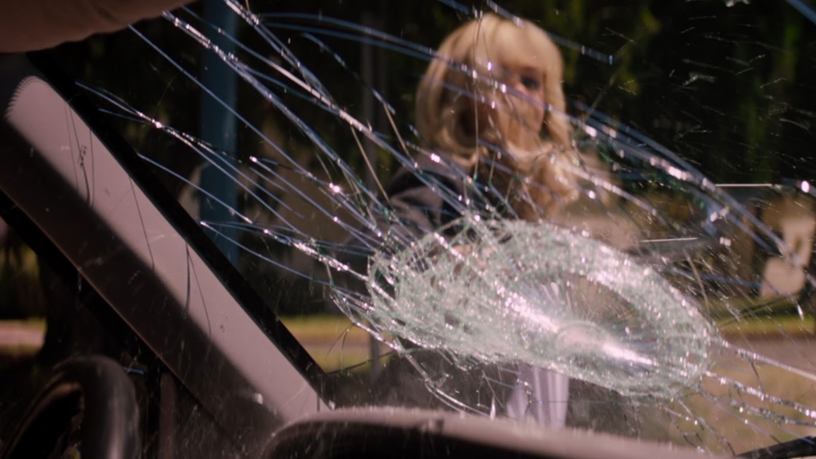 Cassie batters a windshield in Promising Young Woman