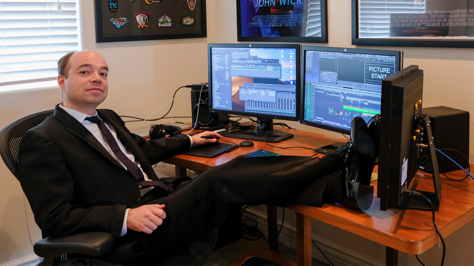 Film editor Evan Schiff seated at his computer.