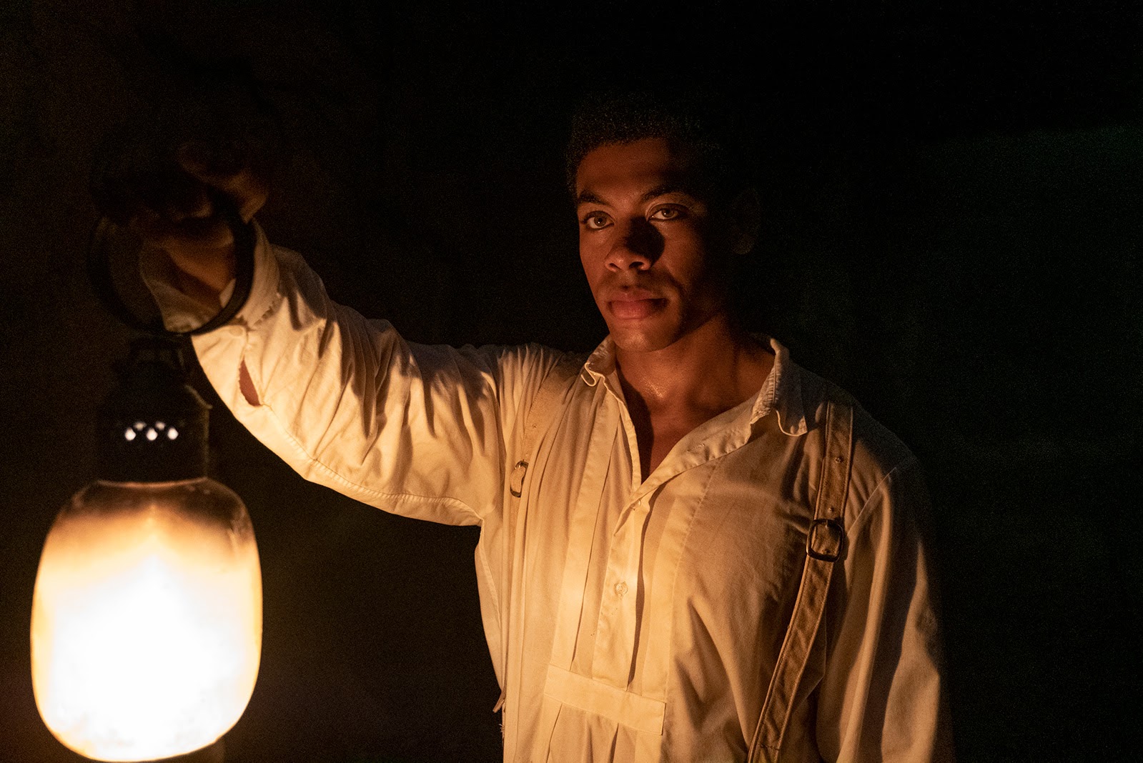 Aaron Pierre as Caesar in The Underground Railroad