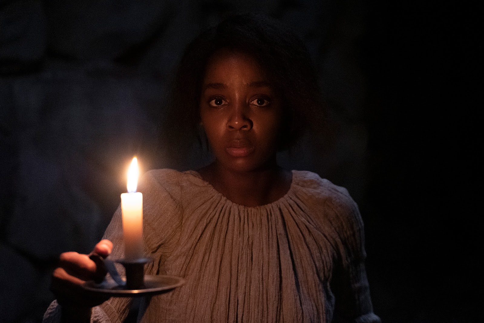 Thosu Mbedu as Cora in The Underground Railroad