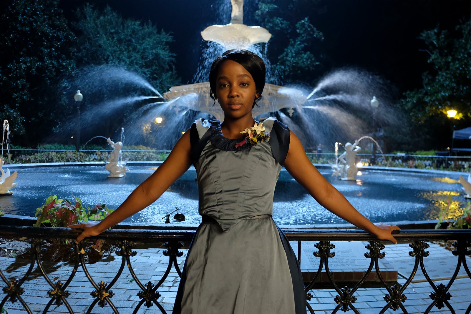 Cora in front of a fountain in The Undeground Railroad