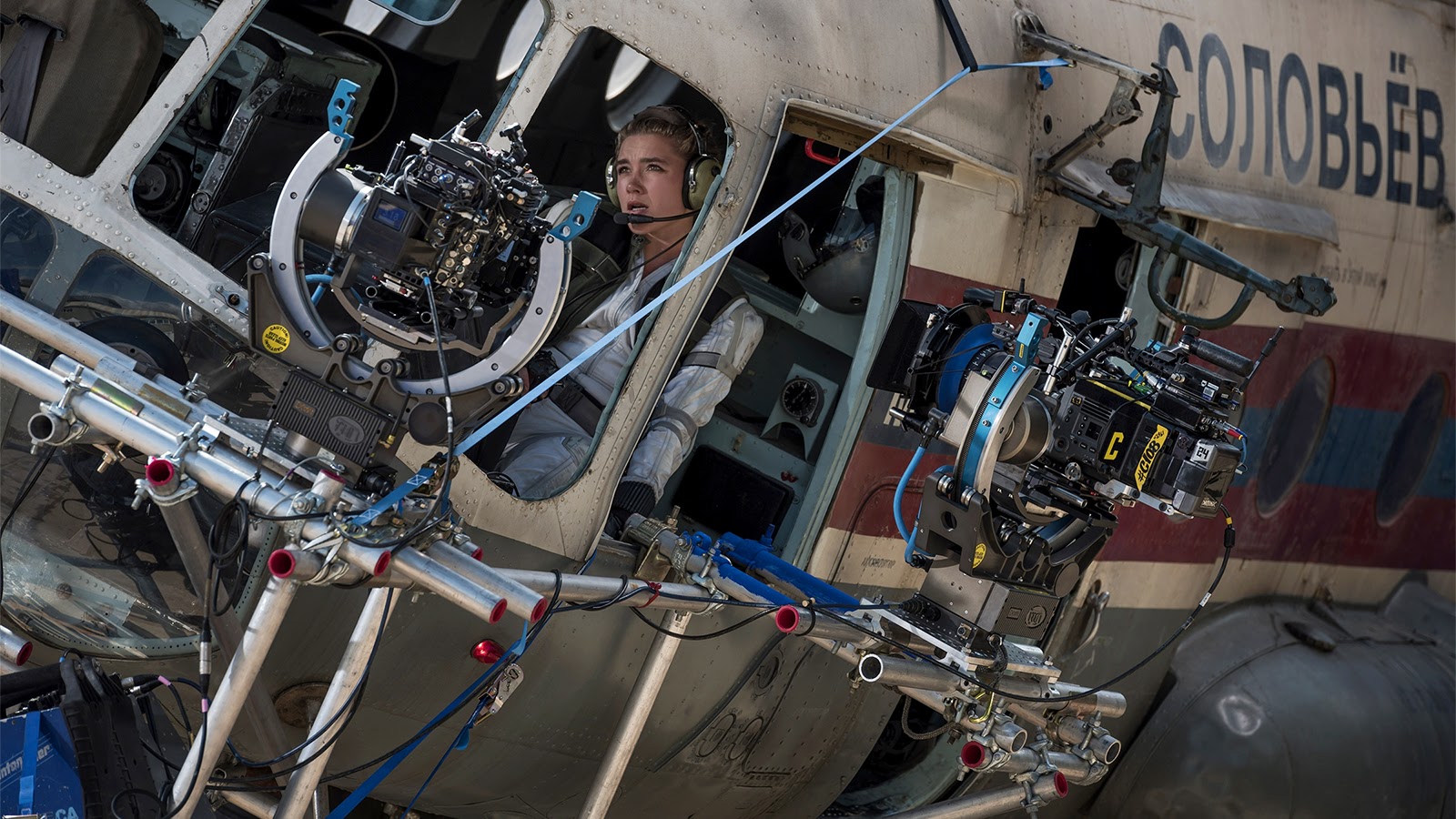 Florence Pugh in the cargo plane rig