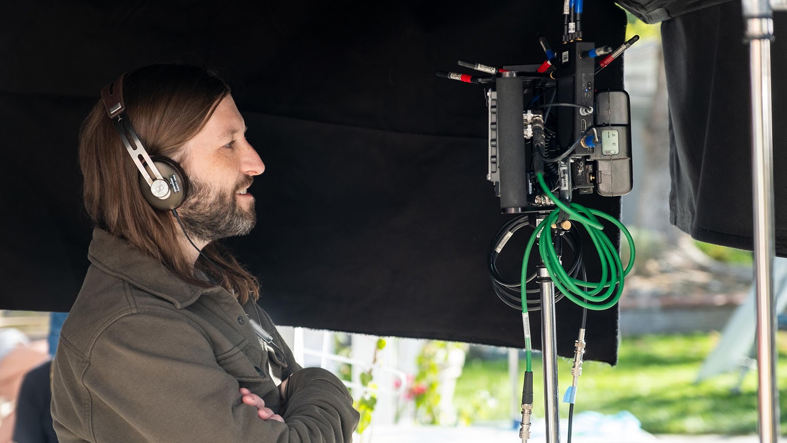 Director/writer Sam Zvibleman watches the monitor