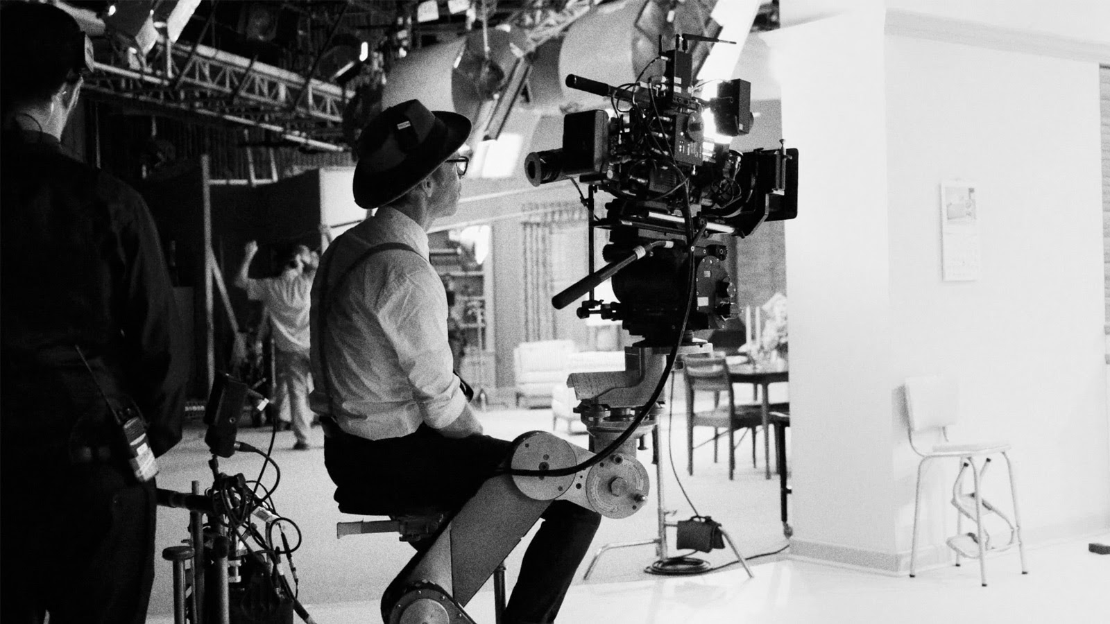 A camera operator in period costume for the filming of episode one of WandaVision