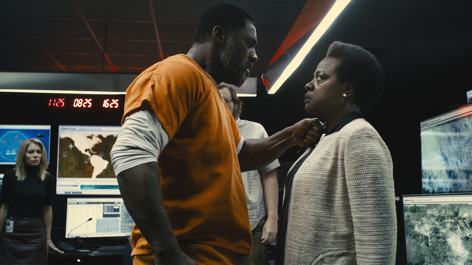 Bloodsport (Idris Elba) confronts Waller (Viola Davis) in The Suicide Squad.