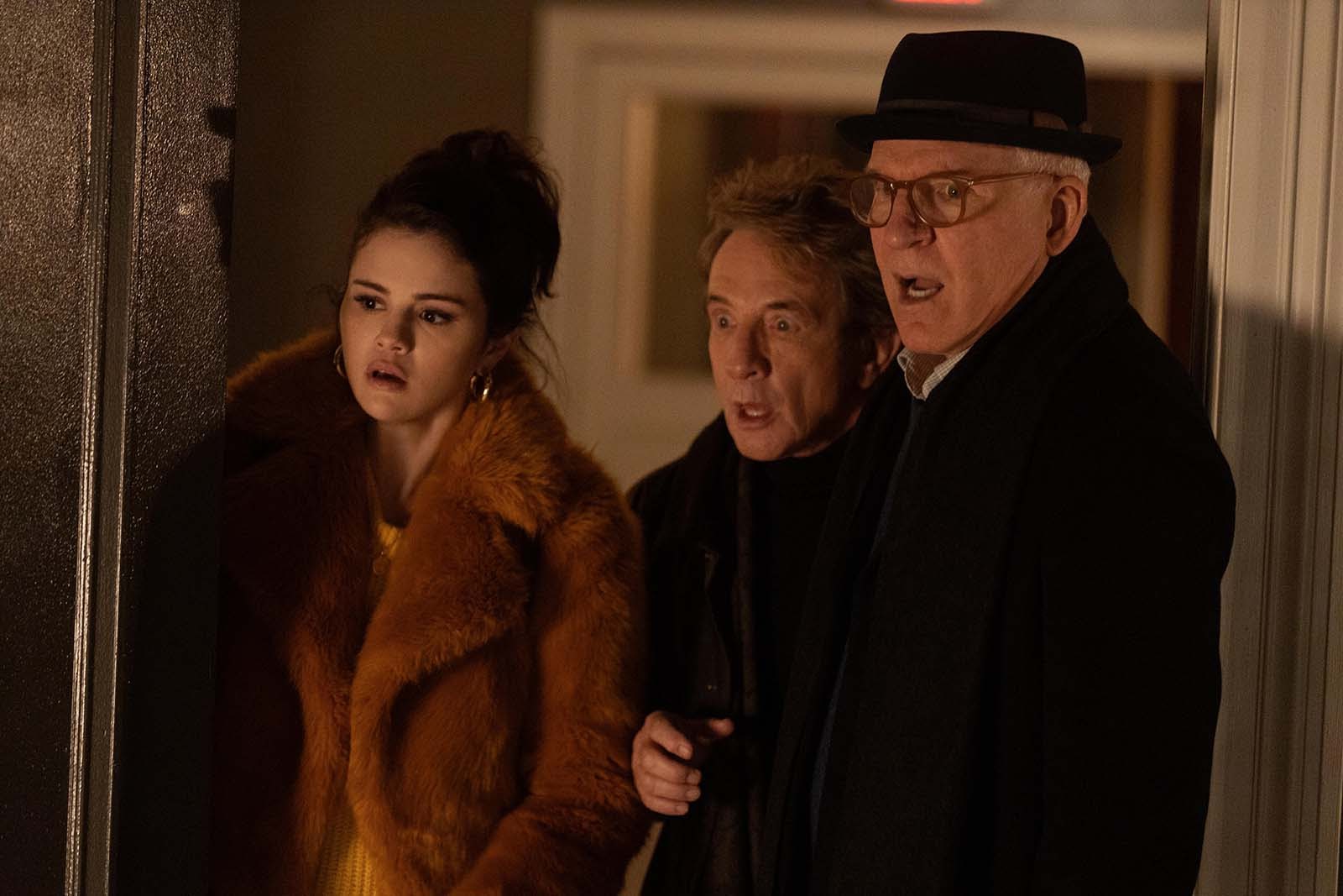 Mabel, Oliver, and Charles-Haden make a discovery in Only Murders in the Building. Image © Hulu