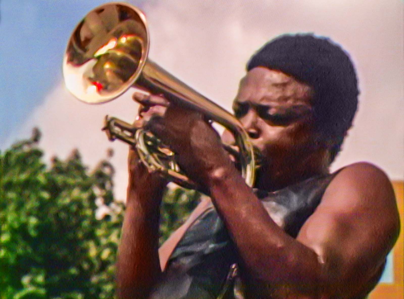 Hugh Masekela plays a mean cornet at the 1969 Harlem Cultural Festival, as featured in Summer of Soul. Image © 20th Century Studios