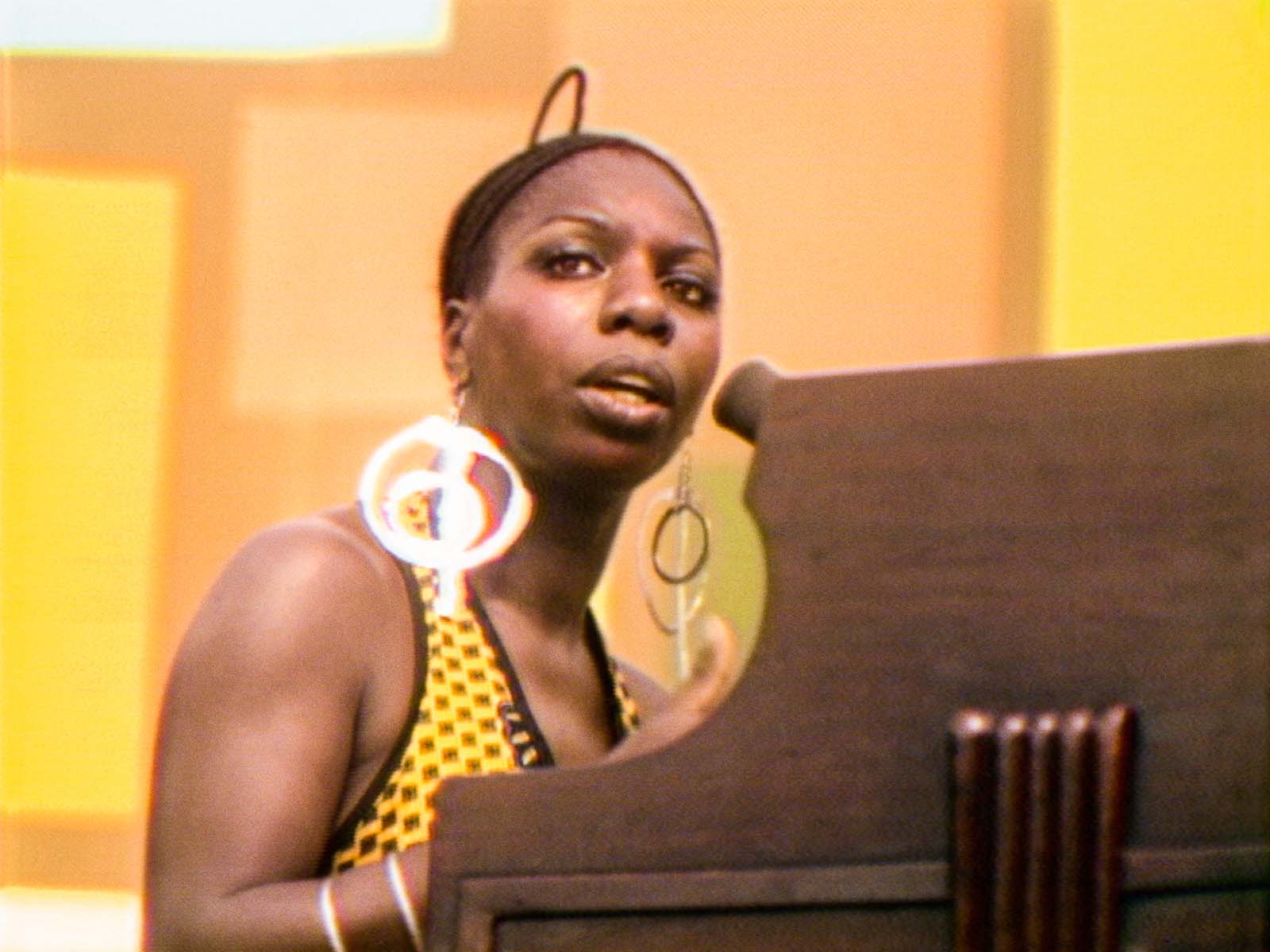 Nina Simone delivers a powerful performance at the 1969 Harlem Cultural Festival in Summer of Soul. Image © 20th Century Studios