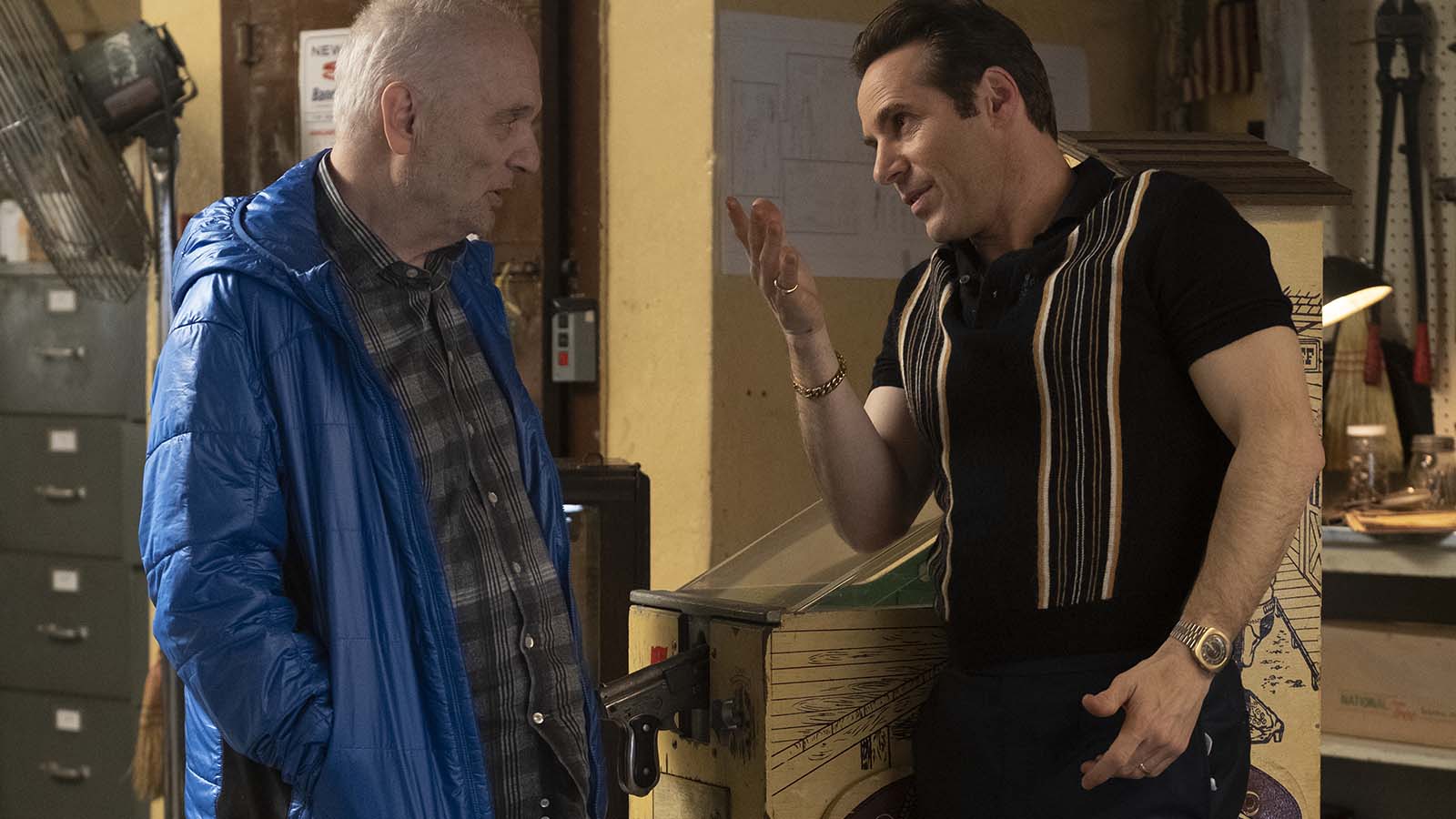 Writer/producer David Chase takes a moment with Alessandro Nivola on the set of The Many Saints of Newark. Image © Warner Bros.