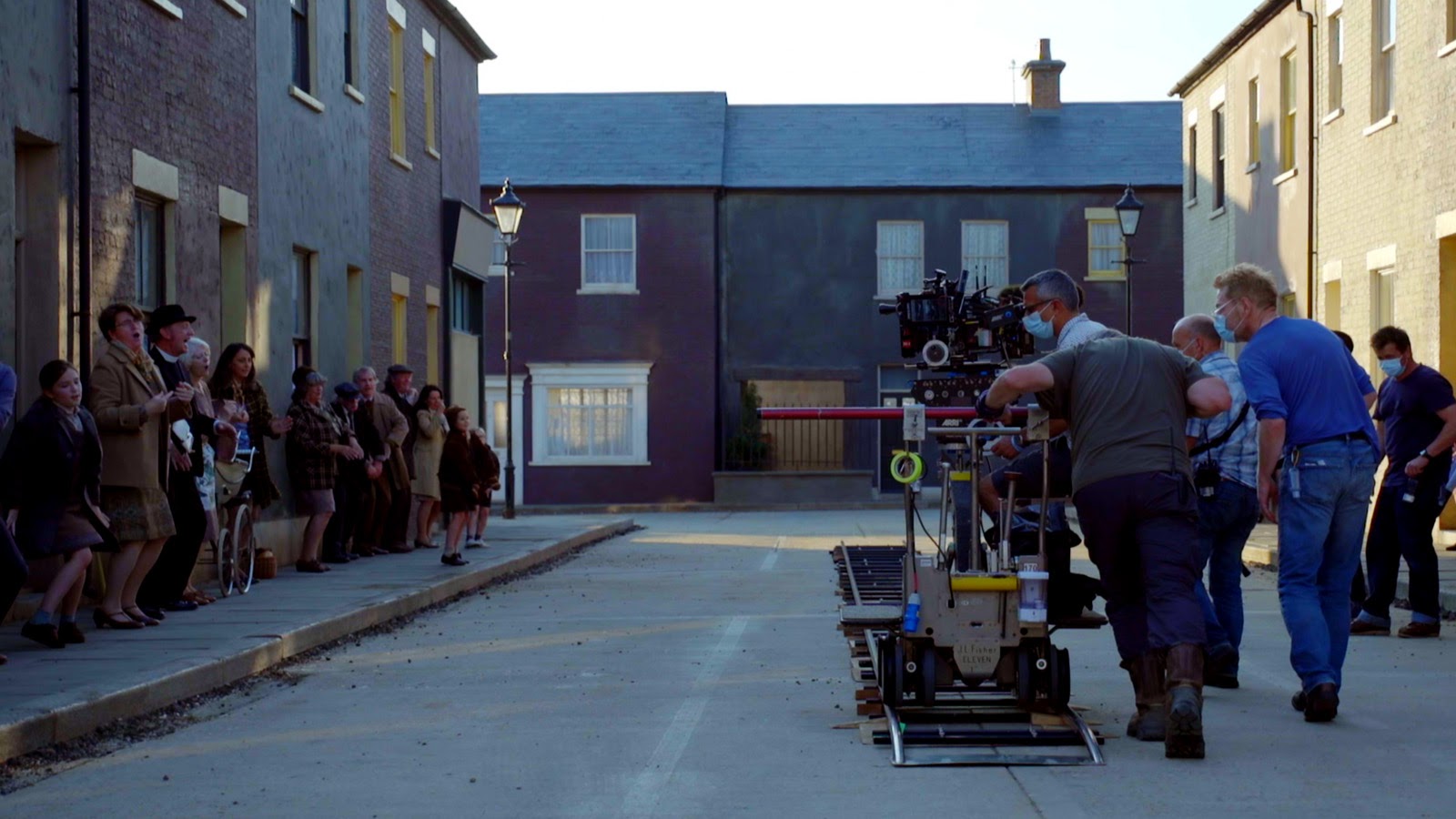 Kenneth Branagh follows the dolly on location for Belfast. Image © Focus Features