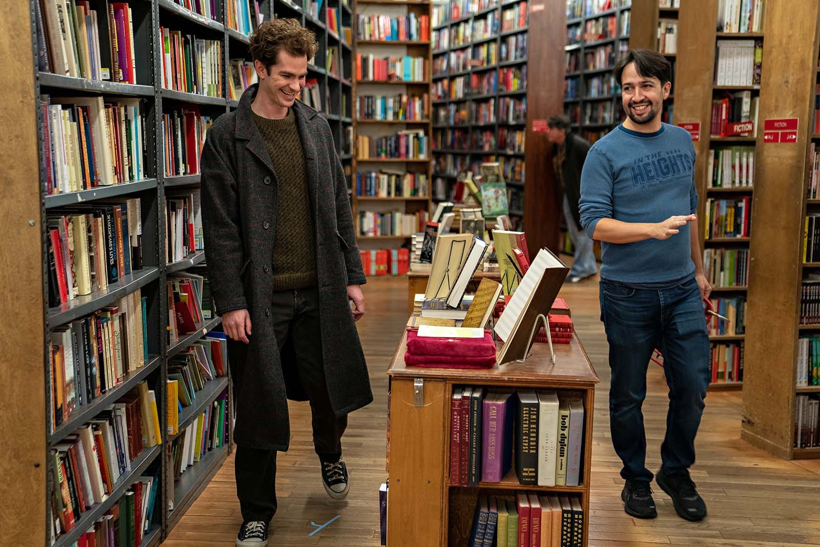 Andrew Garfield and Lin-Manuel Miranda in the bookstore set for tick, tick…BOOM!