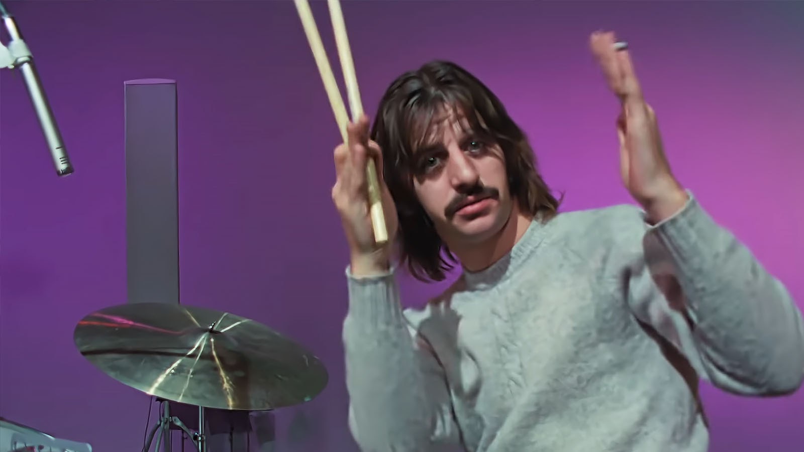 Ringo Starr plays to camera in The Beatles: Get Back. Image © Disney Studios