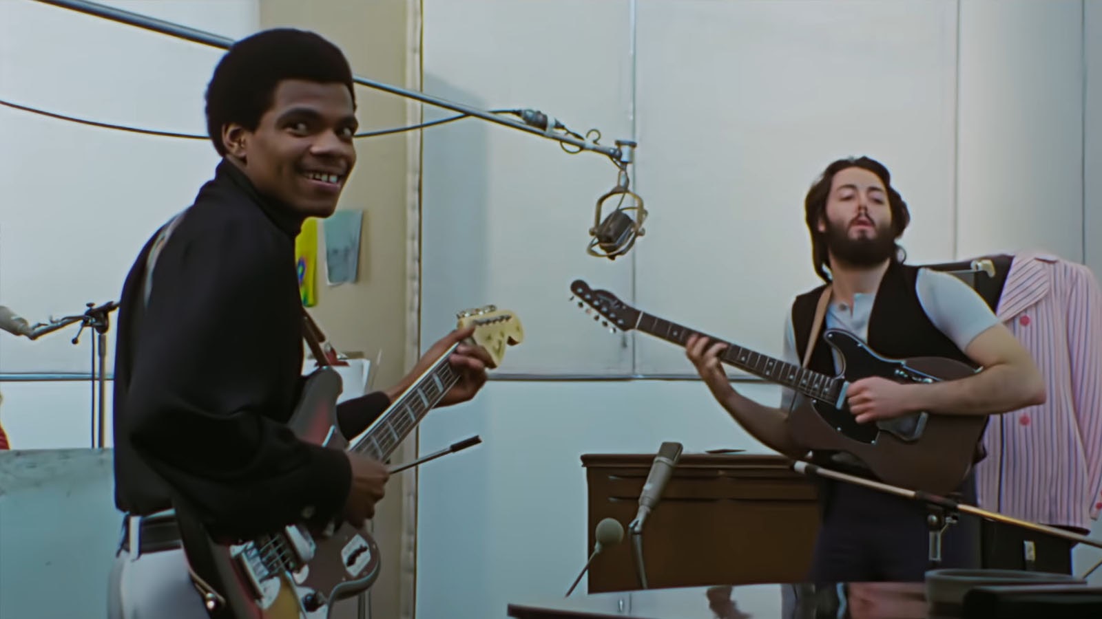 Paul McCartney with Billy Preston, session guitarist and keyboard player on Get Back. Image © Disney Studios