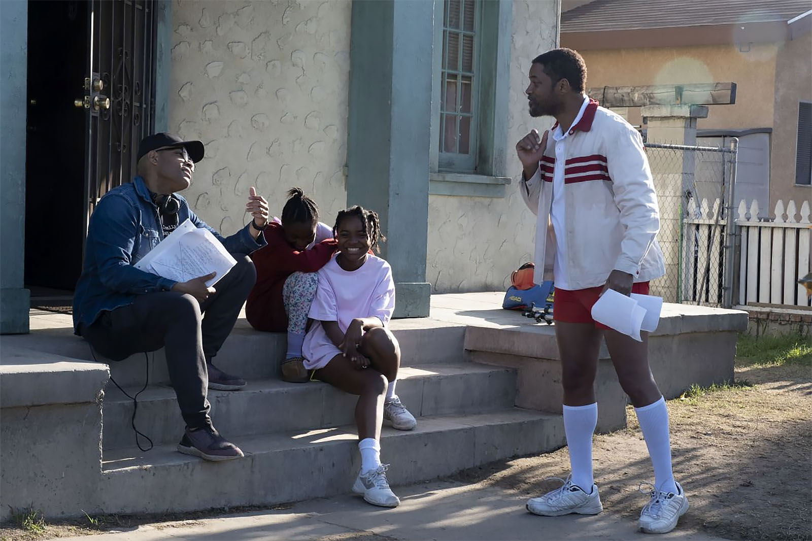 (L-R) Director Reinaldo Marcus with Demi Singleton, Saniyya Sidney, and Will Smith. Image © Warner Bros.