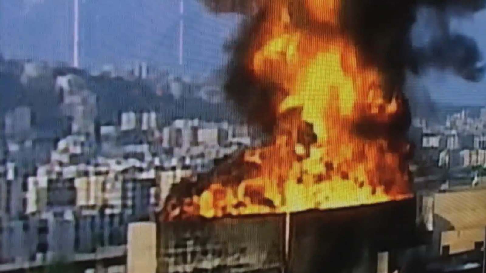 Show footage of bombings in Beirut. Image © Focus Features
