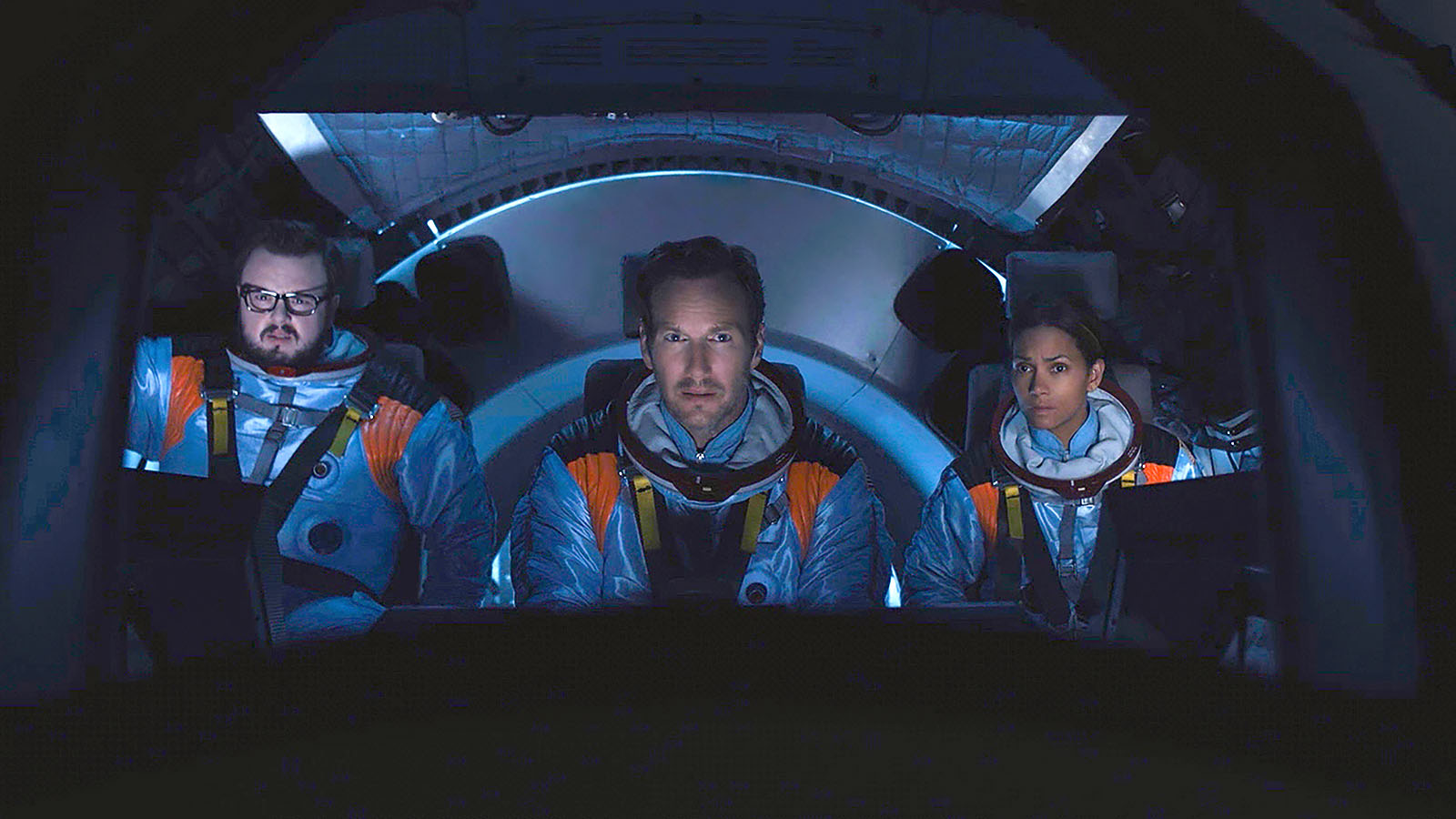 Houseman, Harper, and Fowler in the lander's cockpit. Image © Lionsgate Movies