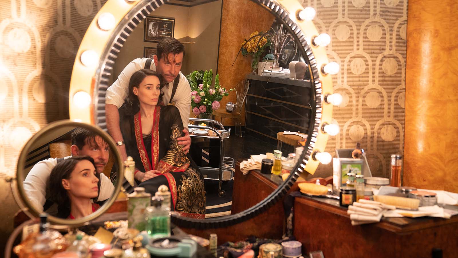 Molly (Rooney Mara) and Stanton (Bradley Cooper) prepare for a show. Image © Searchlight Pictures