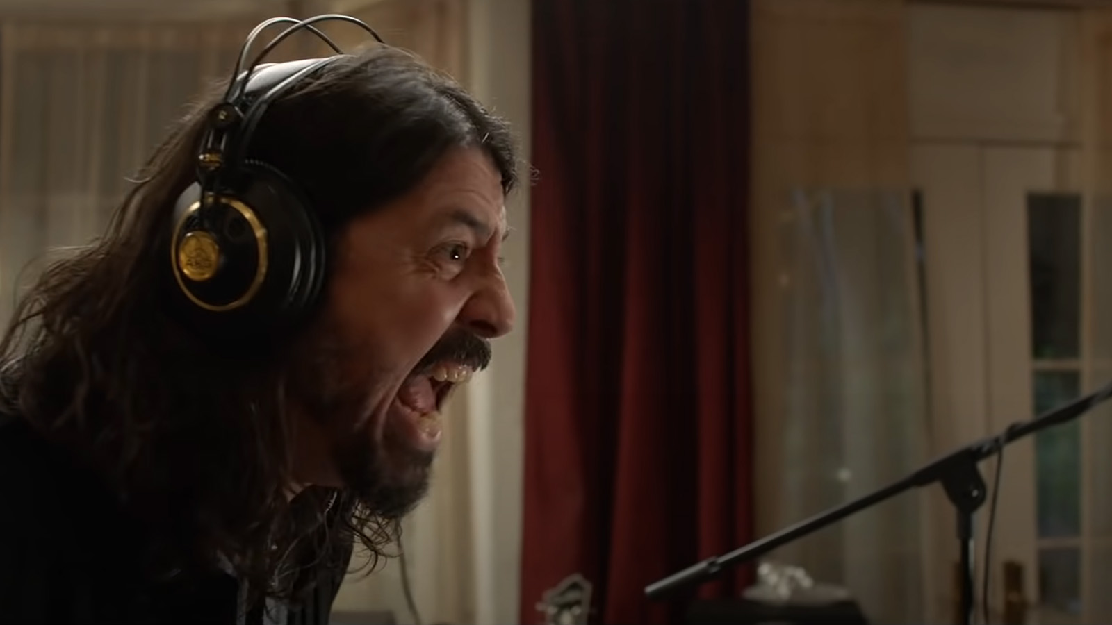 Dave Grohl has a Whiplash moment with drummer Taylor Hawkins. Image © Sony Pictures