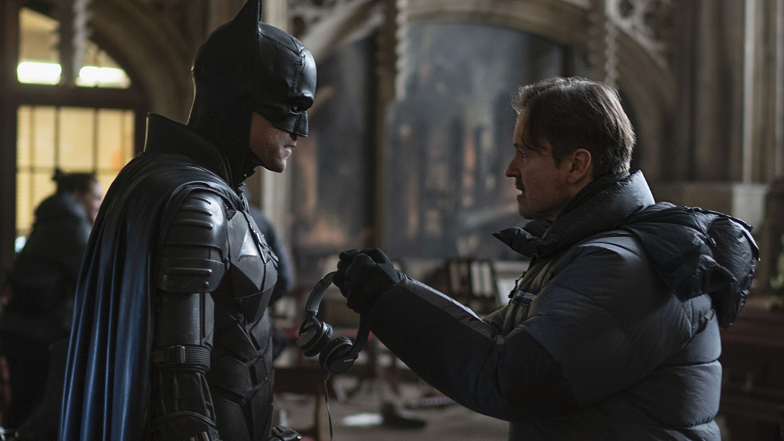 Director Matt Reeves offers direction on location for The Batman. Image © Warner Bros.
