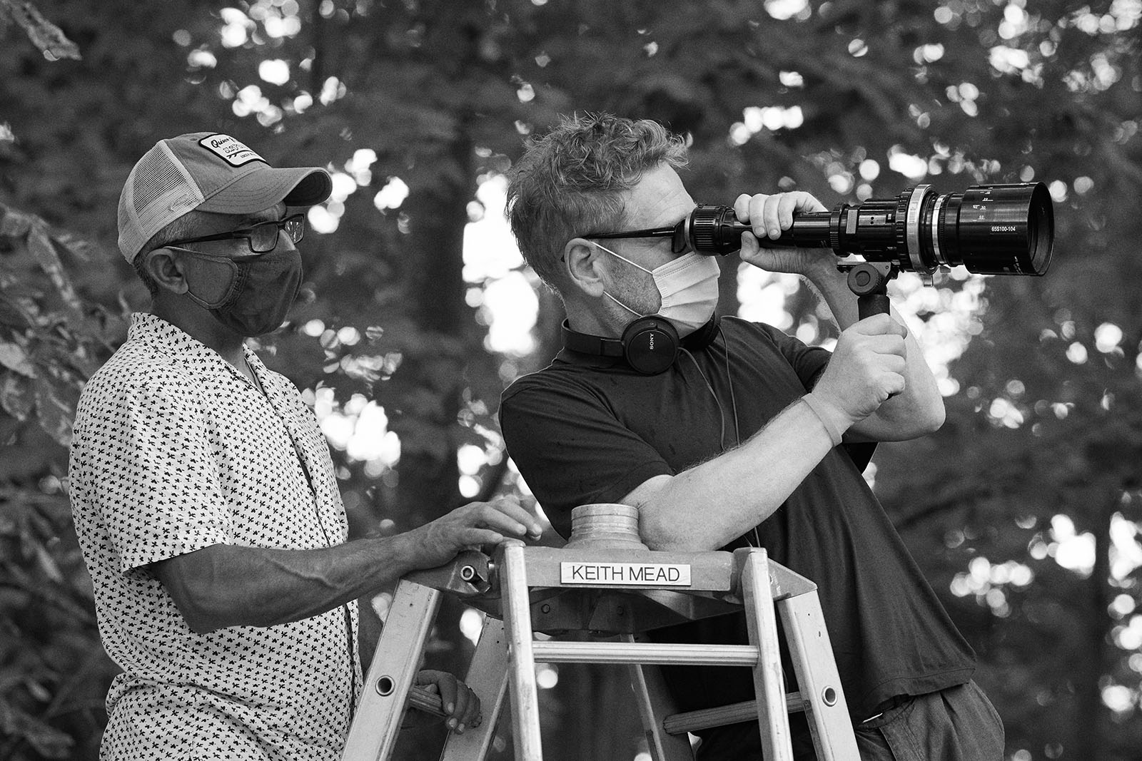 Branagh takes advice from cinematographer Haris Zambarloukos. Image © Focus Features