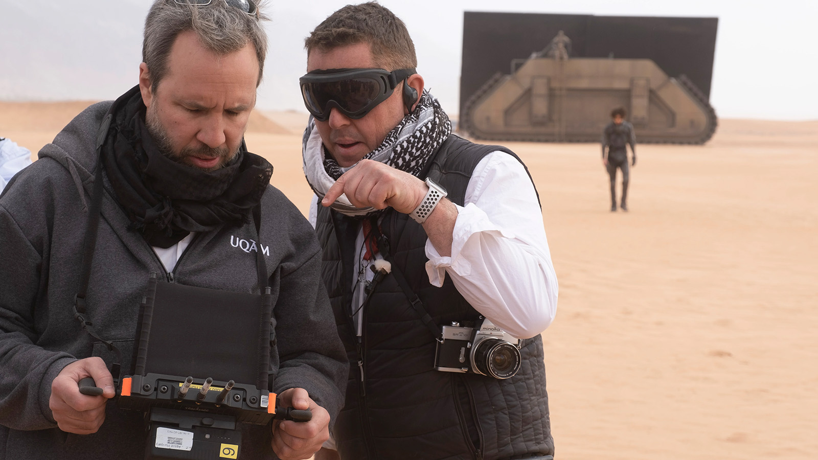 Villeneuve with Fraser, dressed for the Jordanian desert shoots of Dune. Image © Warner Bros