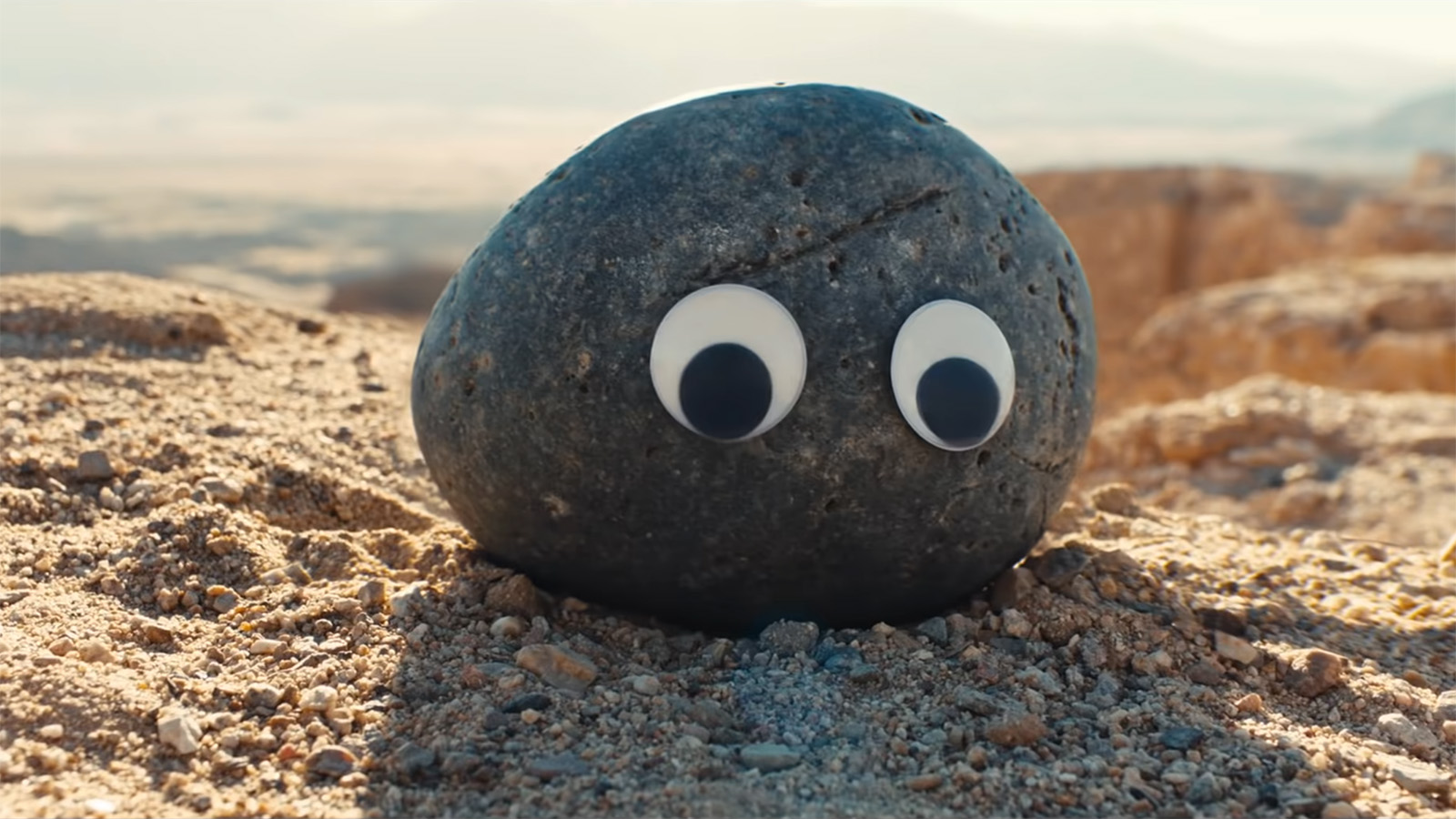 A scene without spoken dialogue and googly-eyed rocks? Sure, why not? Image © A24
