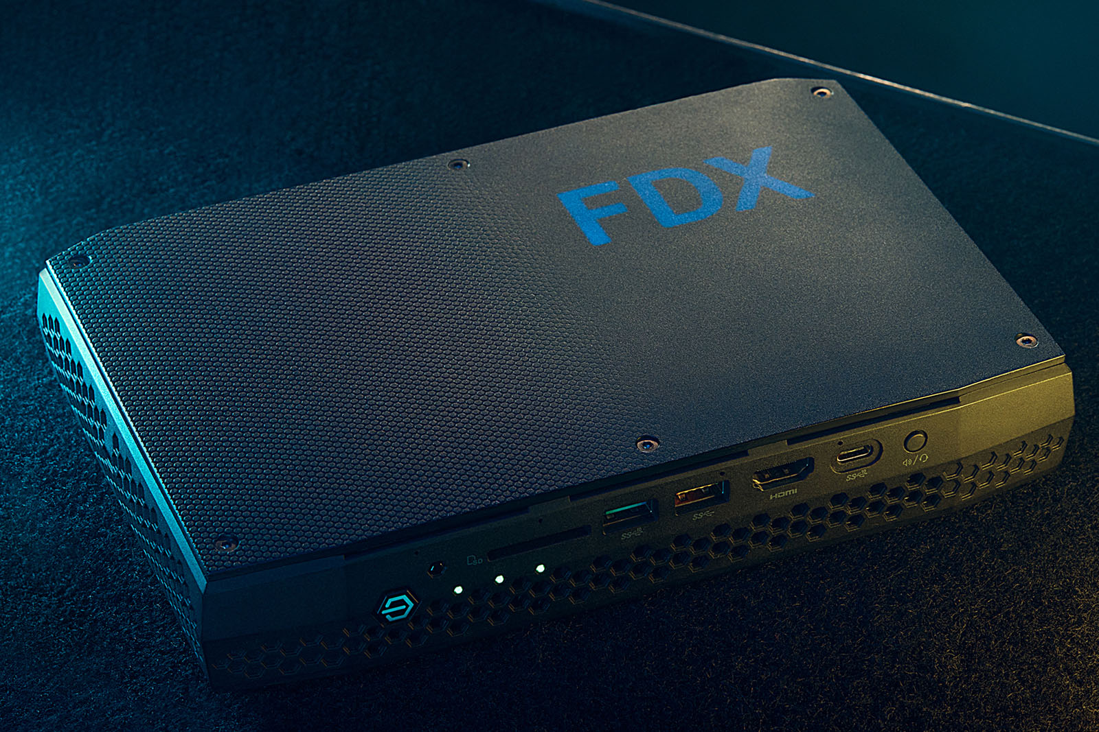 The FDX FilmDataBox handles backup and upload in the field.
