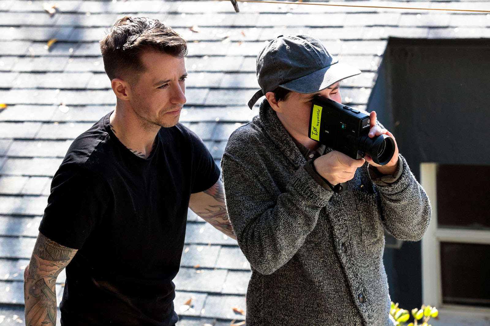 Chase Joynt watches as Aubree Bernier-Clarke shoots with a Minolta FX401 8mm camera.