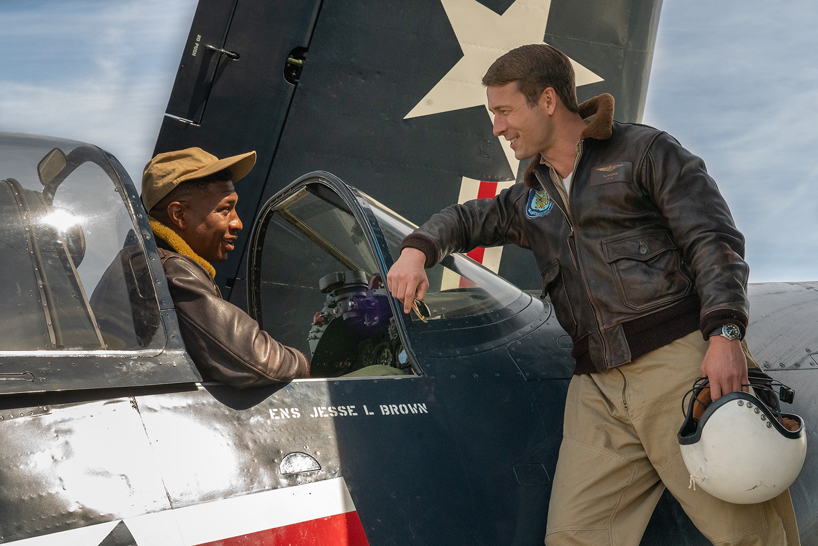 Devotion tells the story of US airmen Jesse Brown (played by Jonathan Masters, left) and Tom Hudner (Glen Powell, right). Image © Sony Pictures Entertainment
