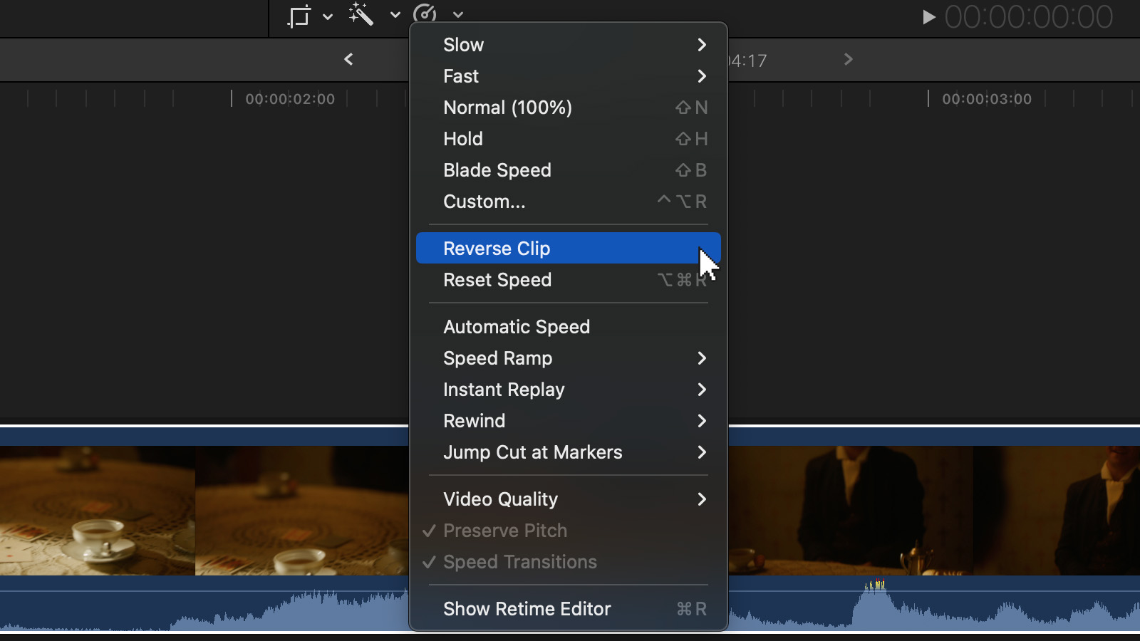 Select the clip, then pick the Reverse Clip option from the retiming dropdown menu.