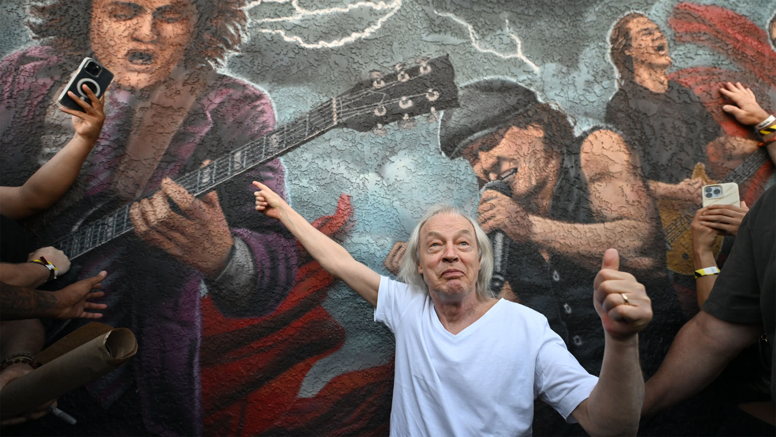 Angus with mural