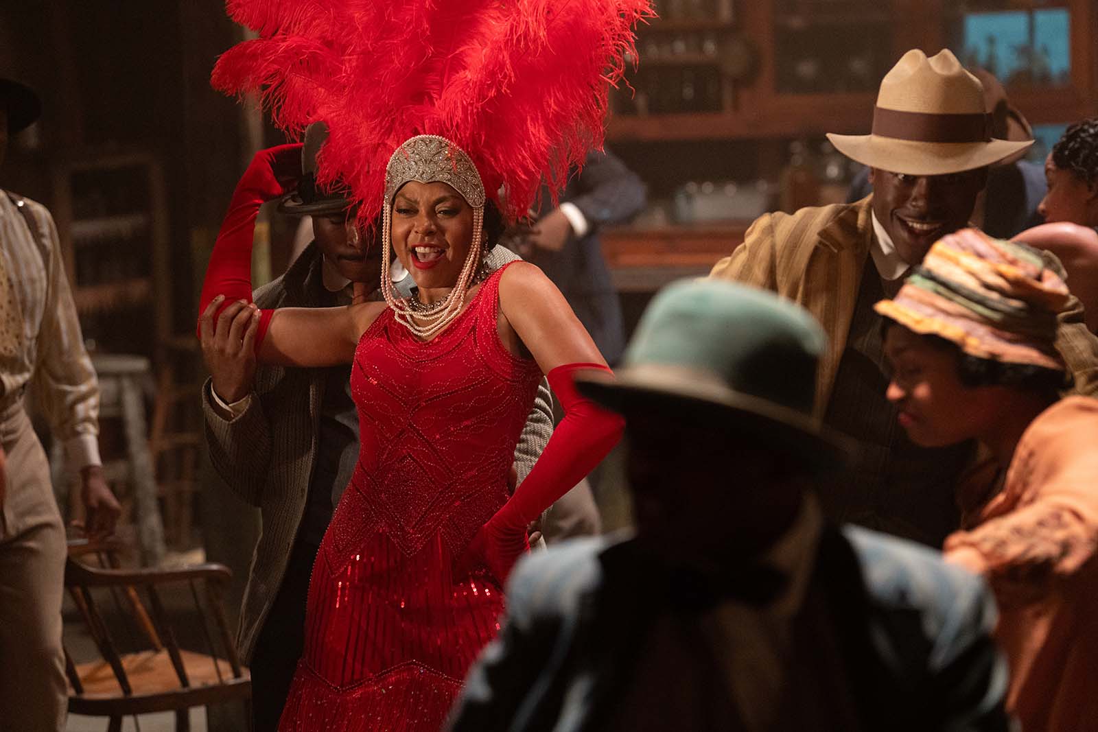 Shug brings down the house with her raucous blues act. Image © Warner Bros. Pictures