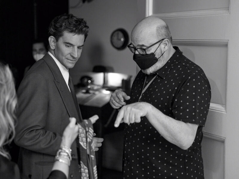 Cooper discussing formal wear with costume designer Mark Bridges. Image © Netflix