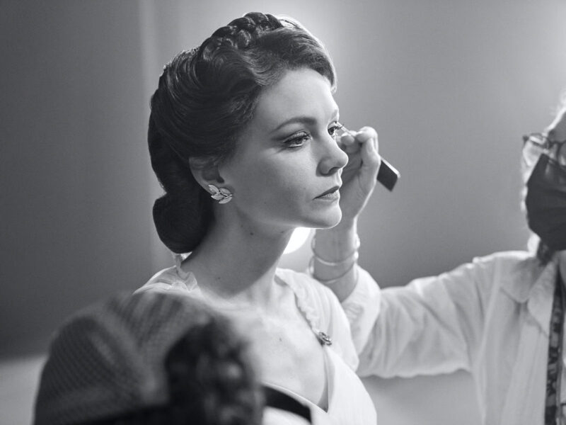 Carey Mulligan gets a touch-up between takes on the set of Maestro. Image © Netflix