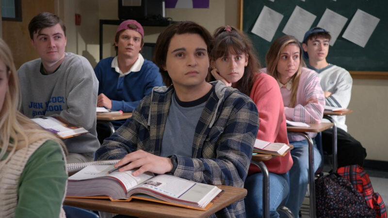 Max Burkholder plays a younger version of John Bennett, who was played by Mark Wahlberg in the Ted feature films. Image © Peacock