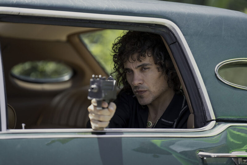 Martín Rodríguez plays Rivi, Griselda’s most valued enforcer, whose actions eventually lead to her downfall. Image © Netflix