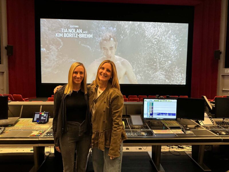 Editors Tia Nolan and Kim Boritz-Brehm on the final mix stage in front of their credits.