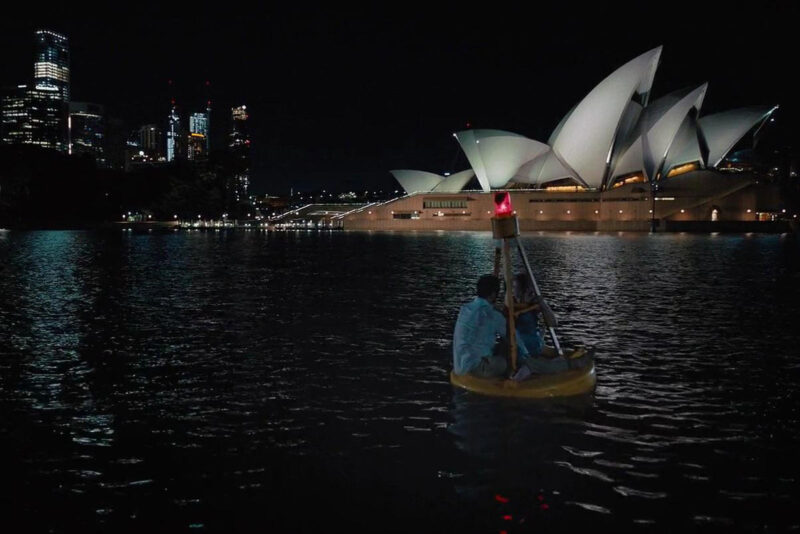 Ben and Bea’s antics get them stranded on a buoy in Sydney Harbor. Image © CTMG, Inc