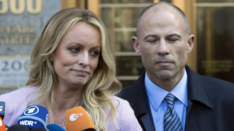 Daniels standing outside federal court with her former lawyer Michael Avenatti in 2018. Avenatti was later sentenced to four years of prison for stealing her book proceeds. Image © Associated Press