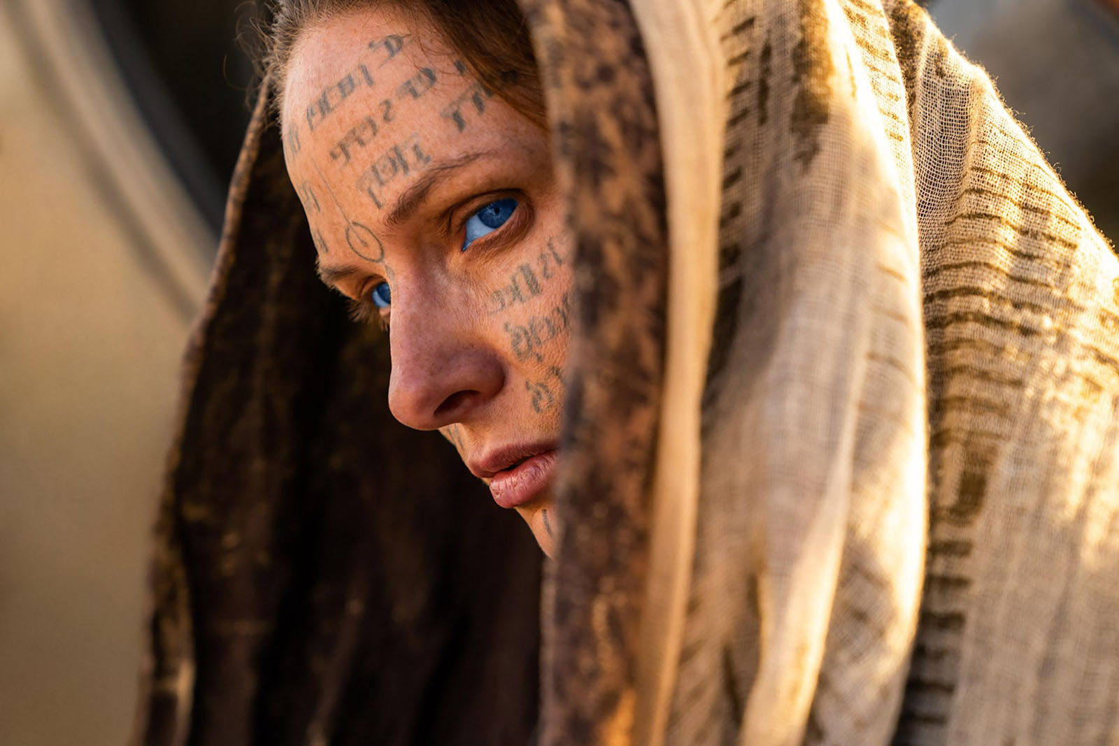 The tattoos on Lady Jessica’s face are the Litany Against Fear. Image © Warner Bros.