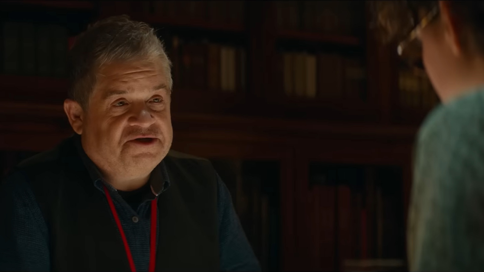 Patton Oswalt plays Dr. Wartzki, a folklore librarian and old friend of Ray Stantz’s. Image © Sony Pictures Entertainment