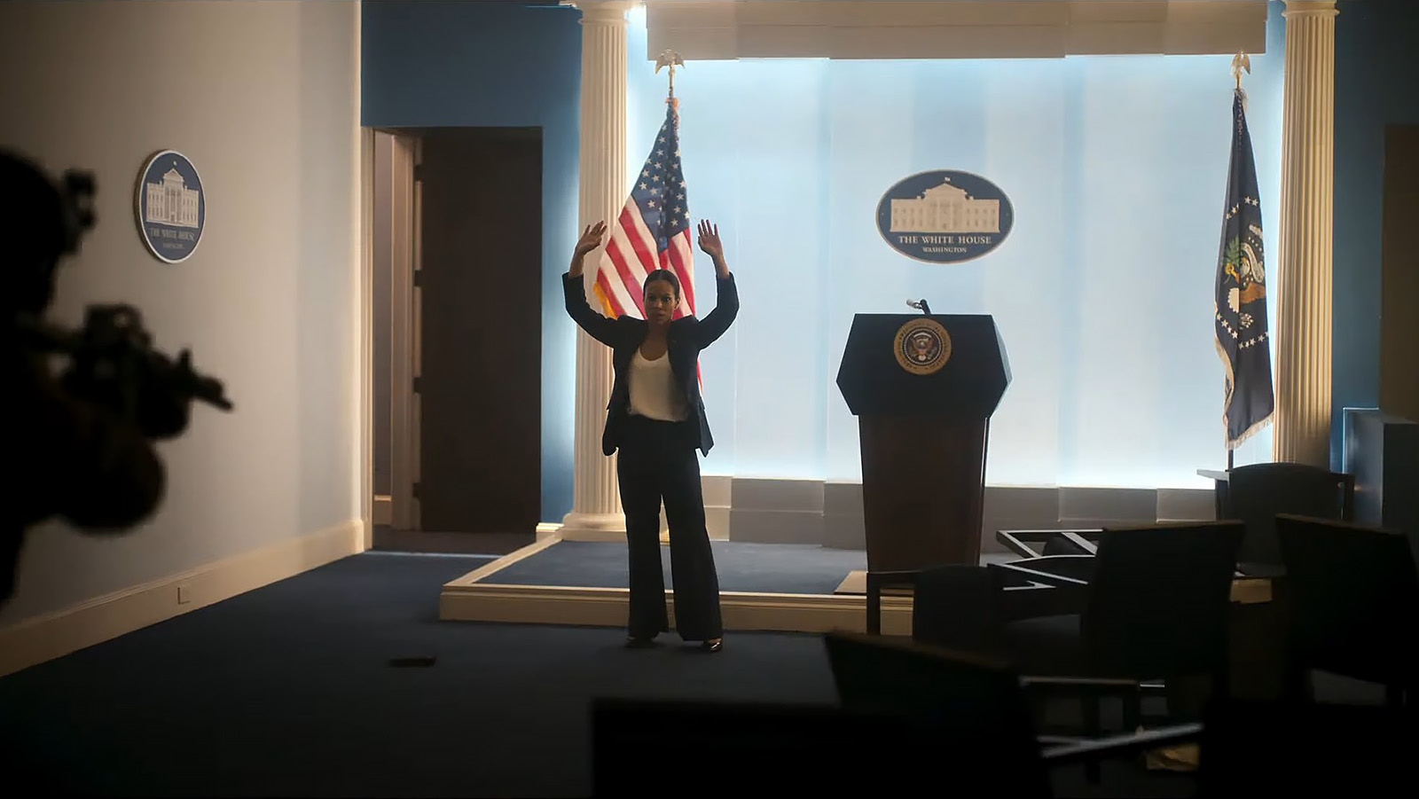 The few people who remained loyal to the president are shocked by the WF’s invasion. Image © A24