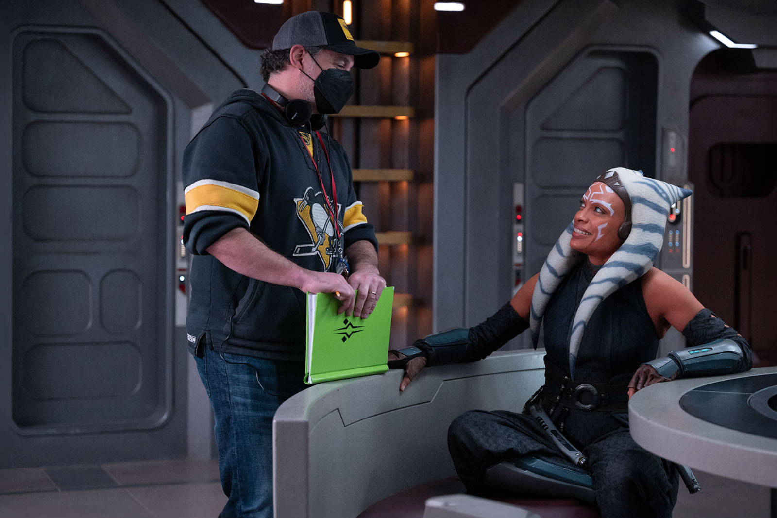 Director Dave Filoni shares a moment with Dawson on the set of Ahsoka.