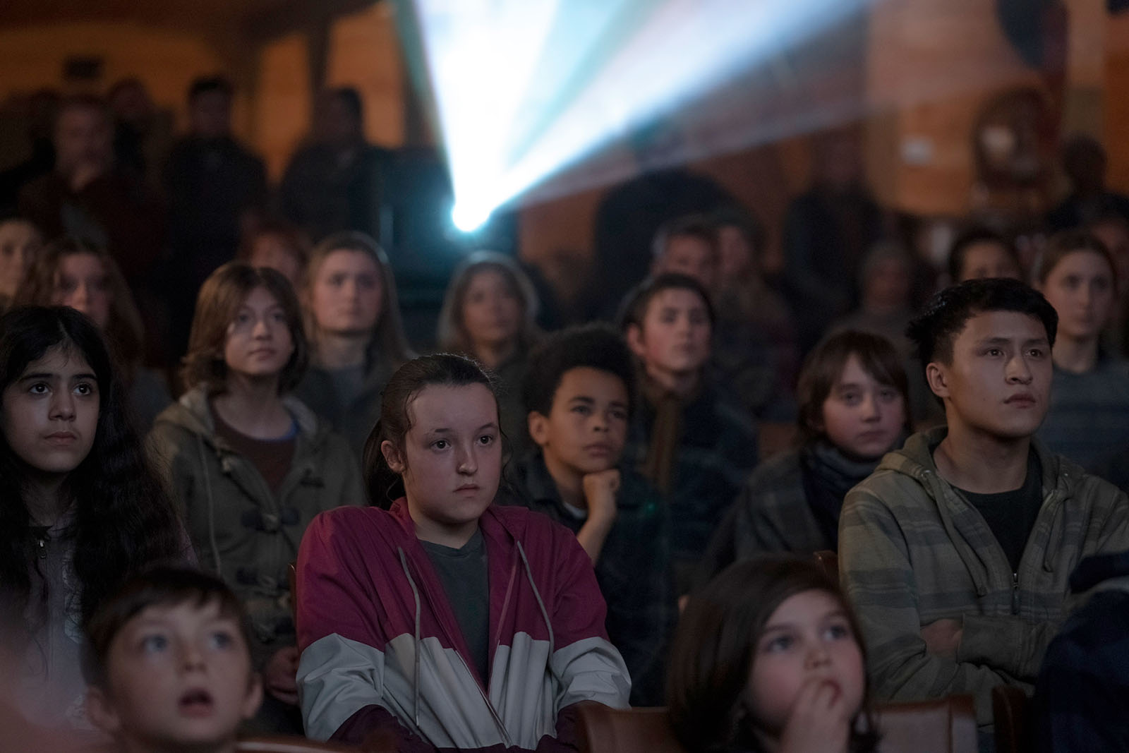 The audience learns along with Ellie, who has spent her life in a military boarding school. Image © HBO